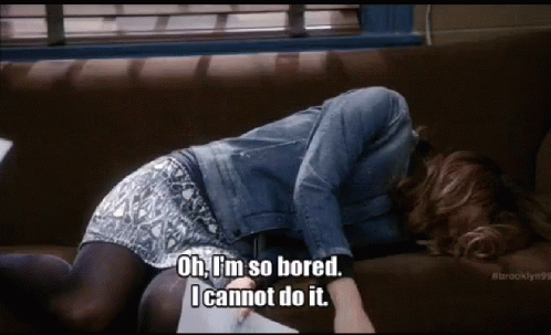 A white woman with jean jacket, patterned skirt, and black hose falls sideways onto a brown couch, with text "Oh, I'm so bored. I cannot do it."