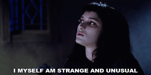 Winona Ryder in full goth mode as Lydia of Beetlejuice says "I myself am strange and unusual"